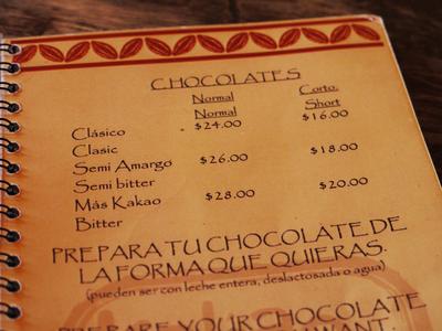 The use of the dollar sign to denote prices in pesos took some getting used to. Rough MXN-to-USD/CAD conversion: divide by 100, multiply by 7. By the way, the &quot;bitter&quot; chocolate is only 50% cacao.