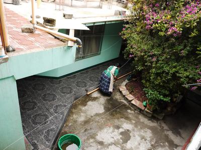 Our host Esperanza working in the garden