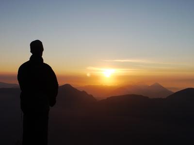 Watching the sun rise over the volcanoes and lake Atitlan