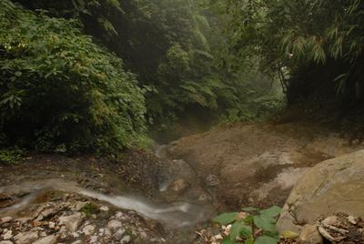 The hot springs flow down away from the pools at Fuentes Georginas