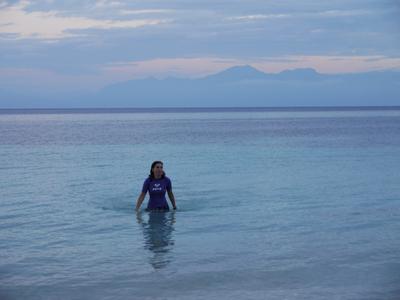 Quick dip after sundown, Utila, with the mountains of the mainland in the background