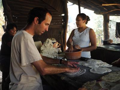 Ron makes very thin tortillas very quickly, unfortunately they always fall apart when lifted.