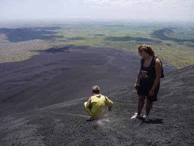 Michael, Quetzaltrekkers' latest recruit, tests out an experimental lightweight volcano board.