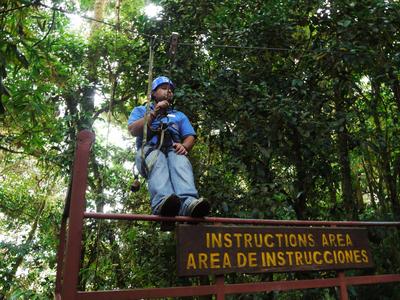 We did one of those 'canopy tour' things. Here the guide is explaining the process ahead of the flight.