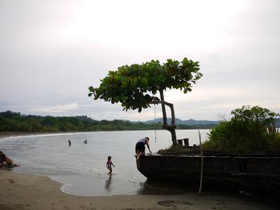 Playa Negra. A rusty old barge serves as a diving platform.