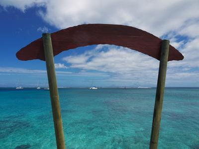 The dock at Lapita Village, with Raiatea in the background. Fare, Huahine