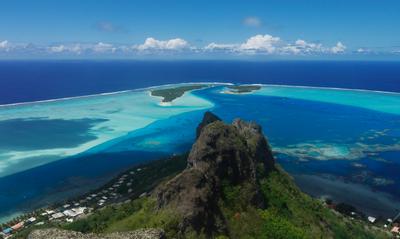 View from Mt. Teurafaatiu, Maupiti. Motu Tiapaa and motu Pitiahe in the background