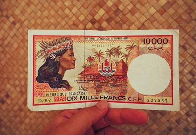 Enormous French Polynesian bills that don't fit in the wallet.