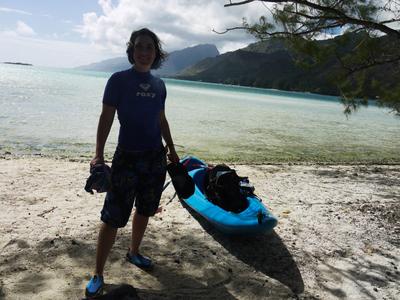 We liked paddling to the rays and sharks so much that we decided to go again the next day. But the weather had turned windy with strong currents, the kayak filled up with water to a dangerous level, and the lagoon was too messy to see very much anyway. So we turned around and paddled to a nearby motu. If Dana is smiling here, it is mostly because she is relieved to be out of the sinking kayak and back on solid ground.