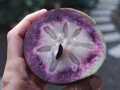 This yummy fruit is known by different names in different places. In French Polynesia it is called pomme etoile (star apple).