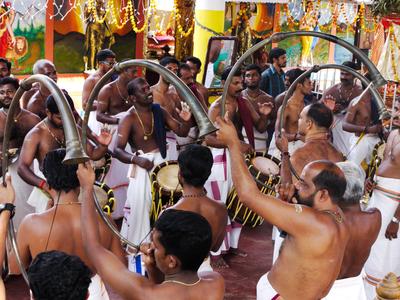 Some kind of Hindu religious festival. We popped in and stayed for a half hour. The noise from the drums and horns is almost unbearable.