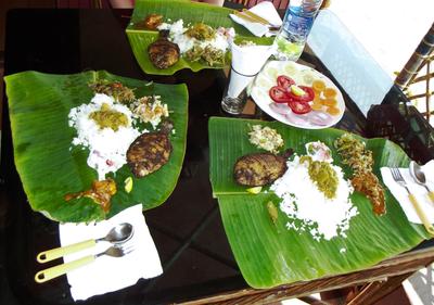 Lunch on the houseboat - "Kerala meal". The local cuisine is distinct, with mild coconut curries, plenty of seafood, and influences from the various seafaring visitors who passed through over the centuries.