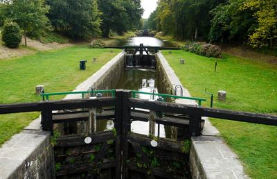 The canal is partitioned by 11 locks within 2 km here