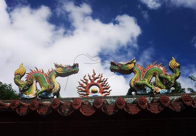 Little shrines everywhere - this one is adjacent to the Guangfu Sugar Factory. The denomination is usually "Buddhist-Taoist-Whatever". The decor varies, but there are always dragons.