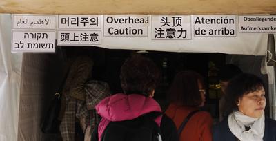 Perhaps the sign is correct in Japanese? It's comically wrong in English, Spanish, Hebrew and Arabic.