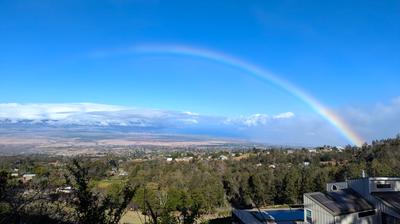 Driving up to Haleakala. We'd never seen a rainbow so robust before - it followed us bright and clear for a good chunk of an hour.